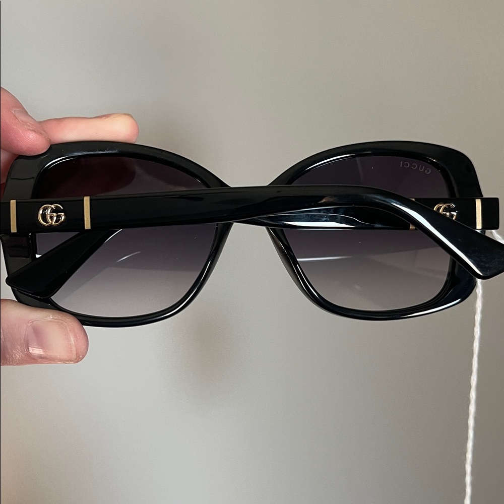 Gucci Women's Black Sunglasses with Gold Accents - Picture 10 of 10